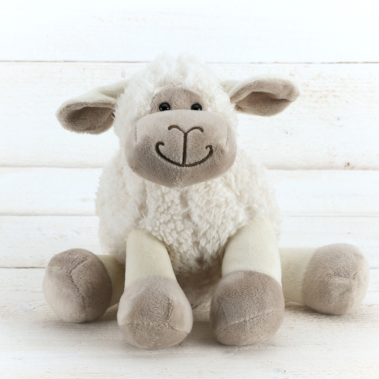 Cuddly sheep toy on sale