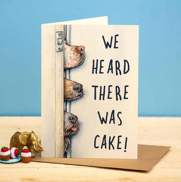 Heard There Was Cake Greetings Card by Bewilderbeest. Image